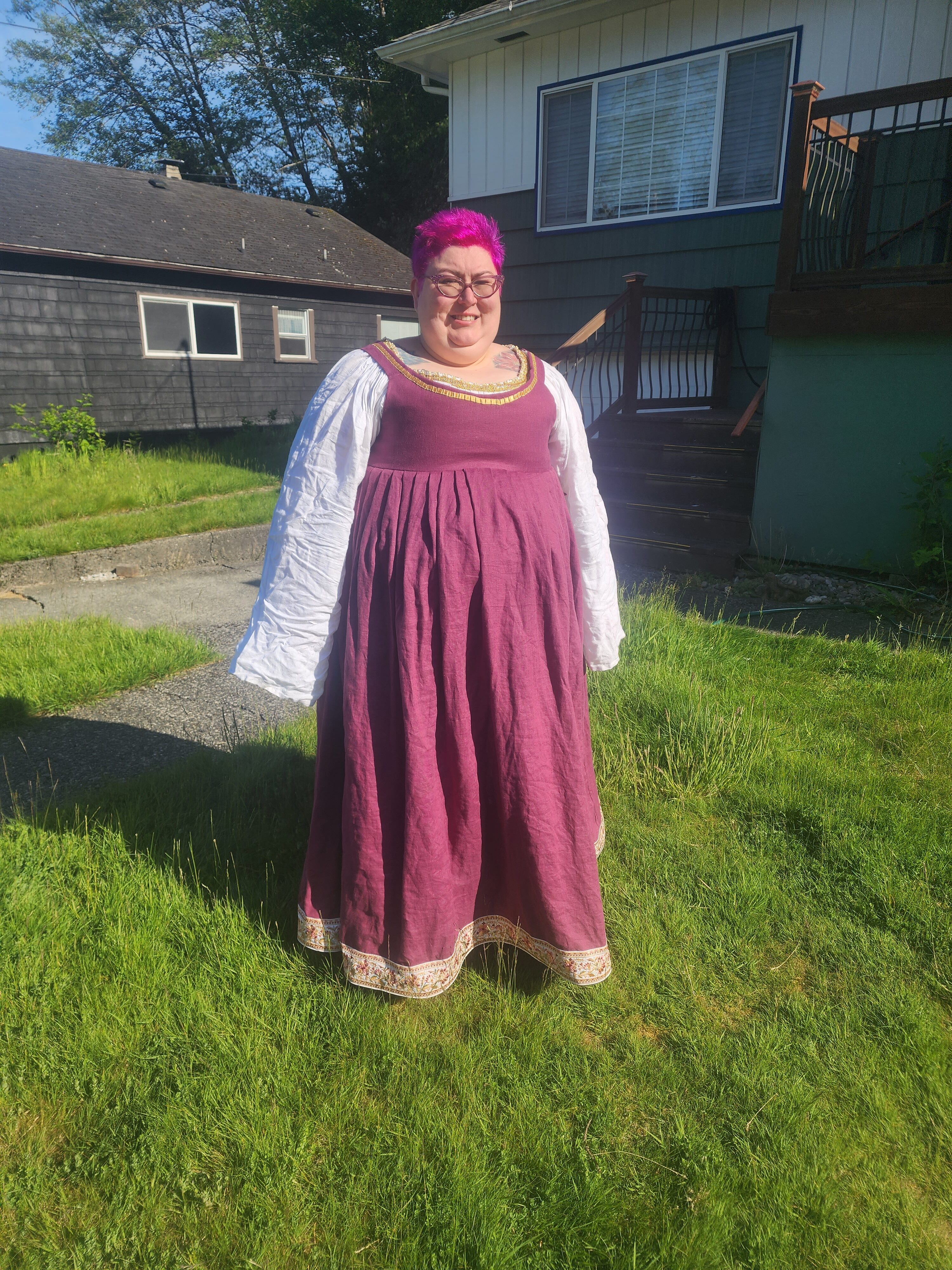 Front of dress as worn on a green grass lawn